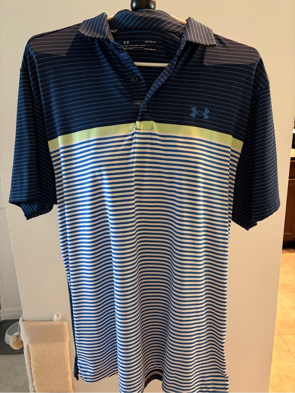 Under Armour Navy and White Striped Polo with Lime Chest Band